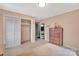 Bedroom showcasing the closet, dresser, neutral walls, and carpet at 549 Dairy Rd, Troy, NC 27371