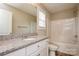 Bathroom features granite vanity and a shower/tub combo at 571 Westside Cir, China Grove, NC 28023
