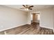 Living room with hardwood floors and an open concept to dining area at 571 Westside Cir, China Grove, NC 28023
