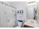 Clean bathroom with shower/tub combo and a linen cabinet at 6307 Pennacook Dr, Charlotte, NC 28214