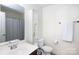 Simple bathroom with toilet, sink, and shower at 6307 Pennacook Dr, Charlotte, NC 28214