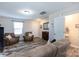 Bright living room with two armchairs, a half bath, and entryway at 6307 Pennacook Dr, Charlotte, NC 28214