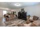 Open living space with large sectional sofa and adjacent dining area at 6307 Pennacook Dr, Charlotte, NC 28214