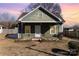 Green house with small front porch at 639 S Eastway Dr, Troutman, NC 28166