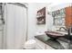 Bathroom features a copper sink, granite countertop, and updated vanity at 6520 Weldon Nw Cir, Concord, NC 28027