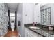 Clean bathroom with granite countertop and updated fixtures at 6520 Weldon Nw Cir, Concord, NC 28027