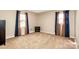 Spacious carpeted bedroom with ample natural light at 6520 Weldon Nw Cir, Concord, NC 28027