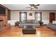 Living room with hardwood floors, fireplace, and comfortable seating at 6520 Weldon Nw Cir, Concord, NC 28027