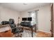 Home office with hardwood floors and built-in desk at 6520 Weldon Nw Cir, Concord, NC 28027