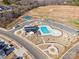 Aerial view of community pool, playground, and parking at 7025 Old Evergreen Pkwy, Indian Trail, NC 28079