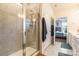 Bathroom with large shower and view into bedroom at 7025 Old Evergreen Pkwy, Indian Trail, NC 28079