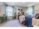 Charming bedroom with a queen-size bed and colorful decor at 7025 Old Evergreen Pkwy, Indian Trail, NC 28079