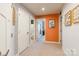 Hallway with patterned walls and access to bedrooms and bath at 7025 Old Evergreen Pkwy, Indian Trail, NC 28079