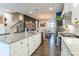 Modern kitchen with white cabinets, granite countertops, and stainless steel appliances at 7025 Old Evergreen Pkwy, Indian Trail, NC 28079