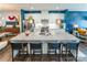 Spacious kitchen with white cabinets, granite countertops, and an island with seating at 7025 Old Evergreen Pkwy, Indian Trail, NC 28079