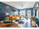 Bright living room with stylish mustard couch and eclectic decor at 7025 Old Evergreen Pkwy, Indian Trail, NC 28079