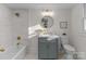 Modern bathroom with gray vanity and marble tile at 809 S Bostian St, China Grove, NC 28023