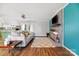 Living room with hardwood floors, fireplace, and an accent wall at 927 Ferguson Ridge Rd, Gastonia, NC 28052