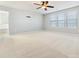 Large bedroom with carpeted floors and access to bathroom at 1000 Lily Pond Cir, Waxhaw, NC 28173