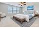 Main bedroom with carpeted floors and a ceiling fan at 1000 Lily Pond Cir, Waxhaw, NC 28173