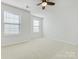 Bright bedroom with neutral walls and carpet at 1000 Lily Pond Cir, Waxhaw, NC 28173