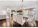 Bright dining room with hardwood floors and access to a patio at 1000 Lily Pond Cir, Waxhaw, NC 28173