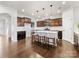 Modern kitchen with island, dark cabinetry, and stainless steel appliances at 1000 Lily Pond Cir, Waxhaw, NC 28173