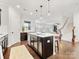 Spacious kitchen with dark cabinetry, an island, and stainless steel appliances at 1000 Lily Pond Cir, Waxhaw, NC 28173