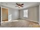 Bright bedroom with ceiling fan and wood-look floors at 105 Linden St, Clover, SC 29710