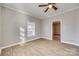 Well-lit bedroom with hardwood floors and access to another room at 105 Linden St, Clover, SC 29710