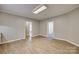 Spacious living area with wood-look floors and an open floor plan at 105 Linden St, Clover, SC 29710