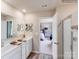 Bathroom with double vanity and view into bedroom at 1189 Blackburn Cir, Edgemoor, SC 29712