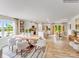 Bright dining room with a wood table and chairs, adjacent to the kitchen at 1189 Blackburn Cir, Edgemoor, SC 29712