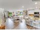 Open concept kitchen with island and view into living room at 1189 Blackburn Cir, Edgemoor, SC 29712