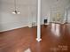 Bright dining room with hardwood floors and chandelier at 12064 Spinnaker Dr, Fort Mill, SC 29708