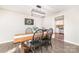 Dining room with light walls, wood floors, a wood table, and black chairs at 1209 Austin Chaney Rd, Wingate, NC 28174