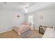 Bright bedroom features a bed, a ceiling fan, and a crib at 1219 Century Dr, Clover, SC 29710