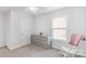 Bedroom featuring a dresser, chair, ceiling fan and carpet flooring at 1219 Century Dr, Clover, SC 29710