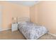 Cozy bedroom with neutral tones, featuring a comfortable bed, and a nightstand with lamp at 1219 Century Dr, Clover, SC 29710