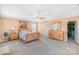 Primary bedroom with wood dresser, ceiling fan, and neutral decor at 1219 Century Dr, Clover, SC 29710