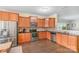 Bright kitchen with stainless steel appliances, wooden cabinetry, and tile backsplash at 1219 Century Dr, Clover, SC 29710