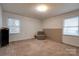 Bedroom featuring a window with natural light and a comfortable chair at 1304 Cambridge Dr, Shelby, NC 28152