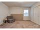 Bedroom featuring a window with natural light and a comfortable chair at 1304 Cambridge Dr, Shelby, NC 28152