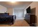 Bedroom with neutral carpet, TV, double door closets and access to outdoor space at 1304 Cambridge Dr, Shelby, NC 28152