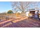 Spacious wooden deck and gazebo, ideal for outdoor dining and relaxation, in a backyard at 1304 Cambridge Dr, Shelby, NC 28152