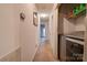 Hallway with laundry area, storage and access to living room at 1304 Cambridge Dr, Shelby, NC 28152