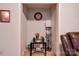 Hallway with a small table, clock, decor, and view of the living room at 1304 Cambridge Dr, Shelby, NC 28152