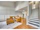 Spacious living room with hardwood floors and a staircase at 1309 Winding Branch Ct, Charlotte, NC 28216