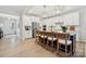 Spacious kitchen with island, stainless steel appliances, and white cabinets at 1482 Hubert Graham Way, Tega Cay, SC 29708