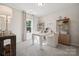 Home office with built-in shelving and desk at 1482 Hubert Graham Way, Tega Cay, SC 29708